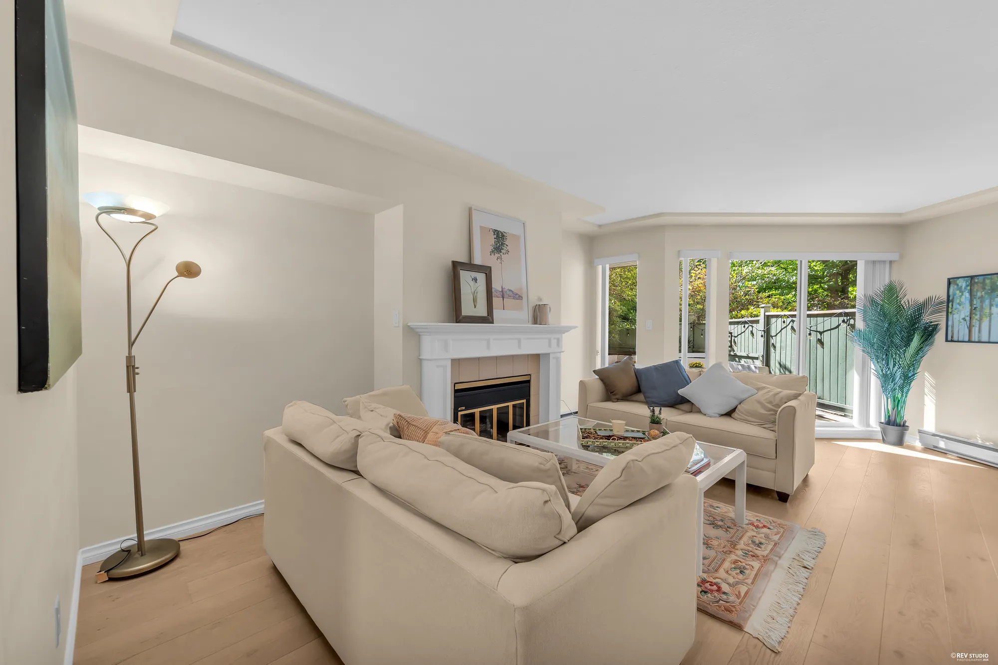 Living room toward the bay window and the deck door